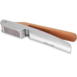 Silver and Brown Garlic Press
